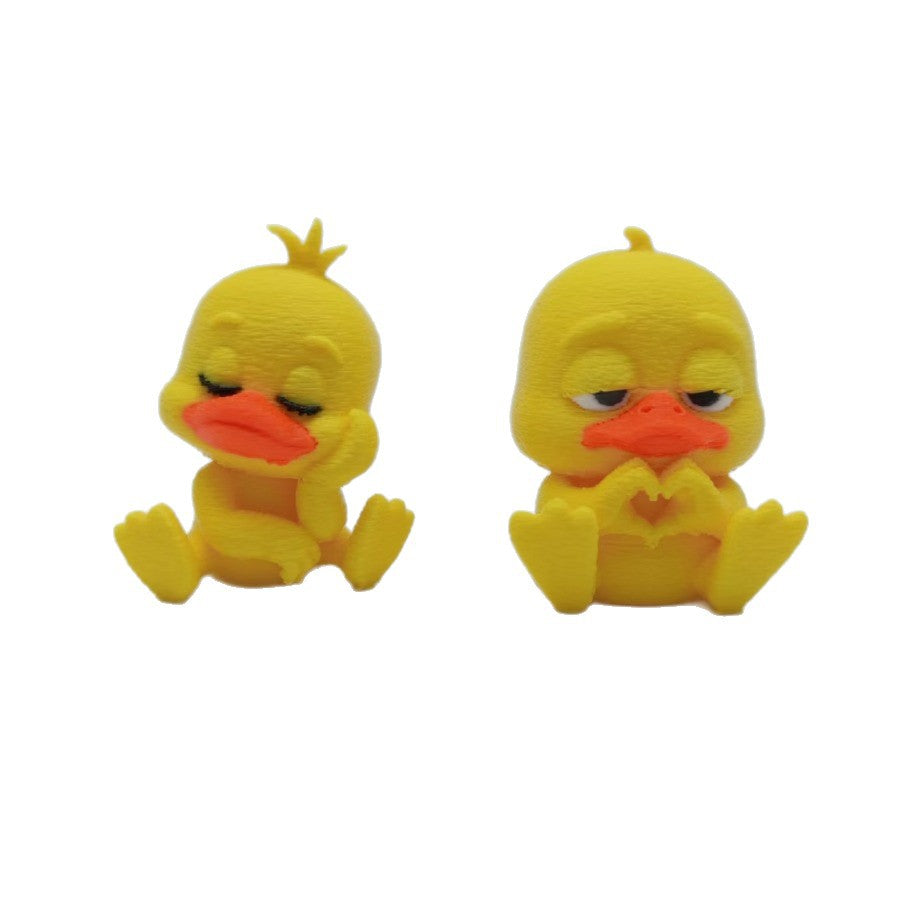 A cute playful and fun little heart-shaped duck figurine perfect for home decor