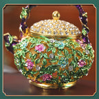 Close-up of flower and leaf details on enamel teapot box