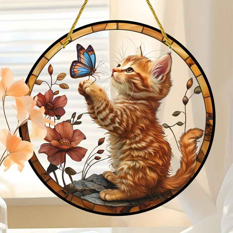 Cat and butterfly hanging ornament near peach flowers