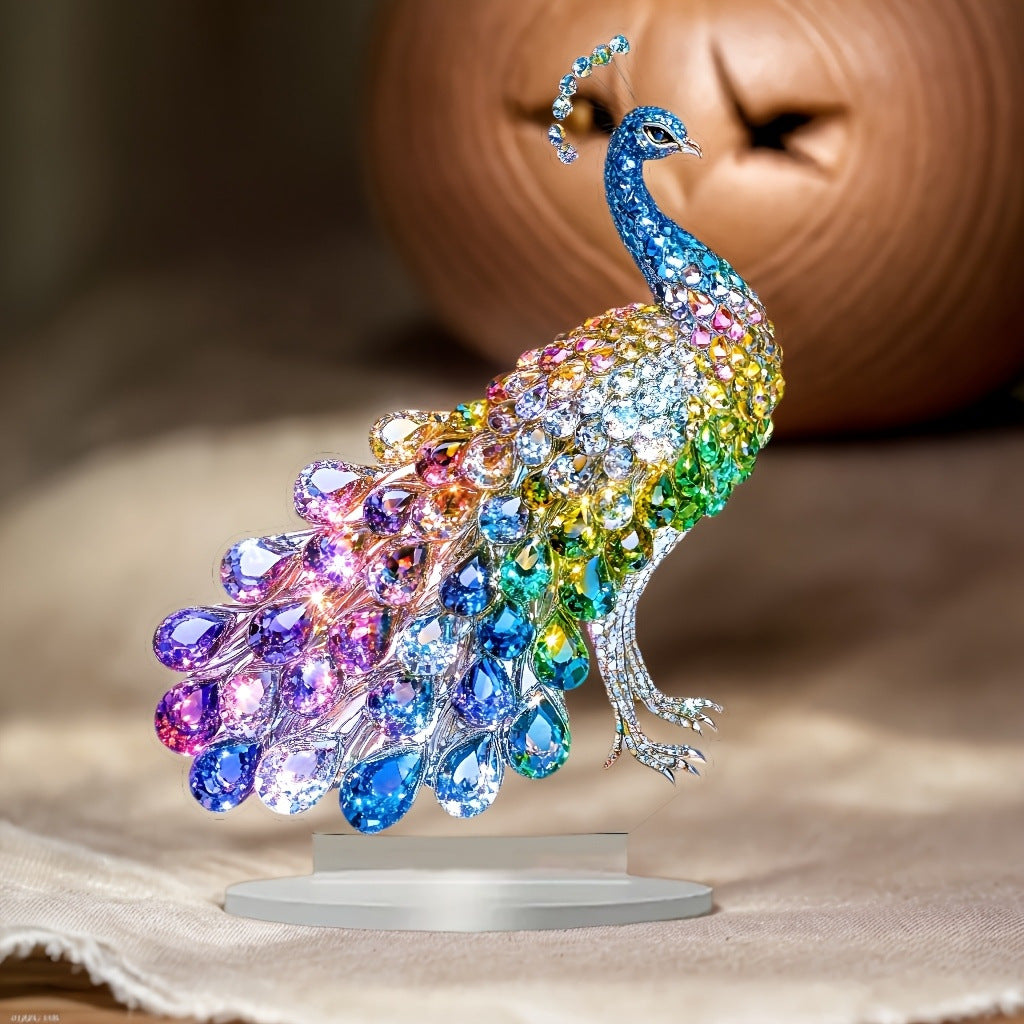 Rainbow peacock acrylic ornament styled near a potted plant