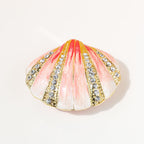 Front view of pink shell jewelry box with decorative ridges