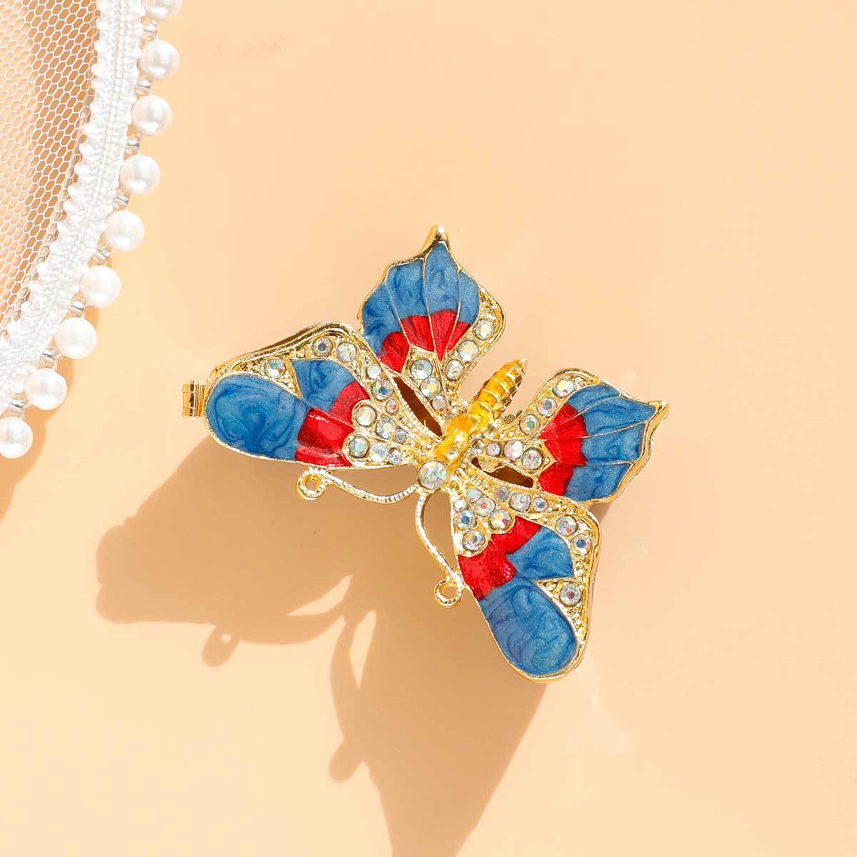 Top view of blue and red butterfly jewelry box