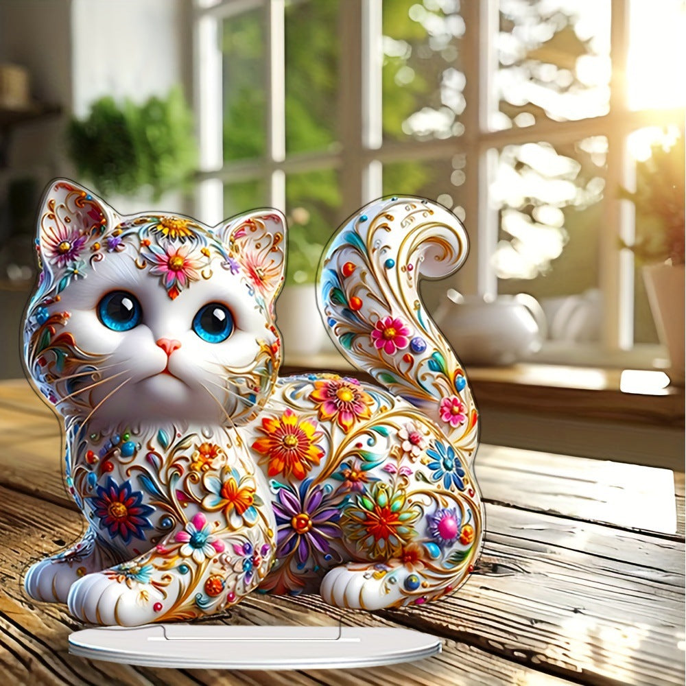 Floral kitten flat acrylic tabletop ornament near a window