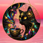 Black cat and coffee cup hanging artwork against a pink sky
