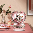 Pink heart cat couple acrylic ornament beside a rose and desserts