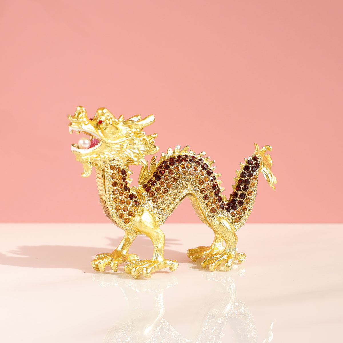 Golden dragon figurine viewed from the opposite side