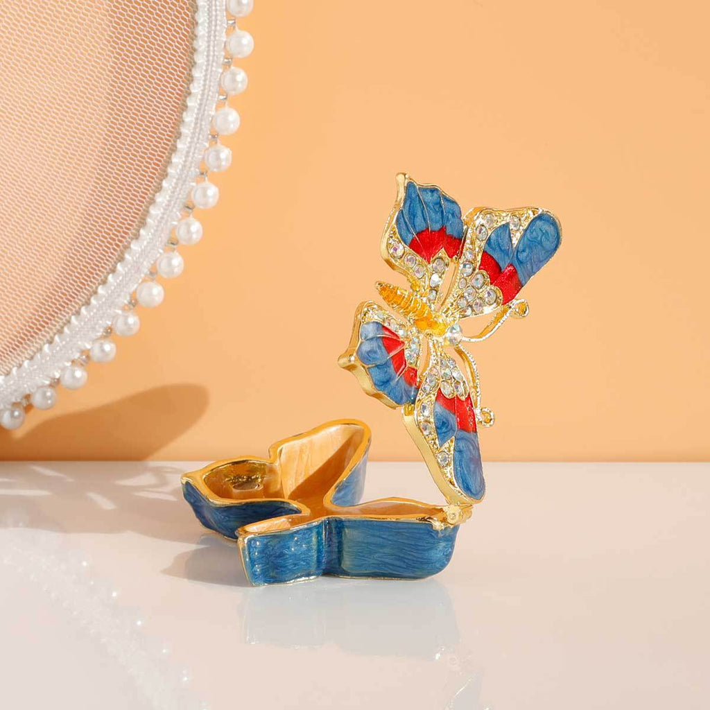 Side view of open butterfly jewelry box