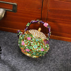 Floral teapot box displayed beside a wooden cabinet