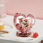 Pink cat couple heart ornament on a white tabletop with pastel backdrop