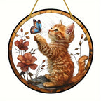 Front view of orange kitten and butterfly hanging artwork
