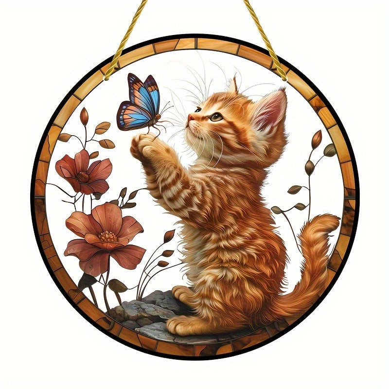 Front view of orange kitten and butterfly hanging artwork