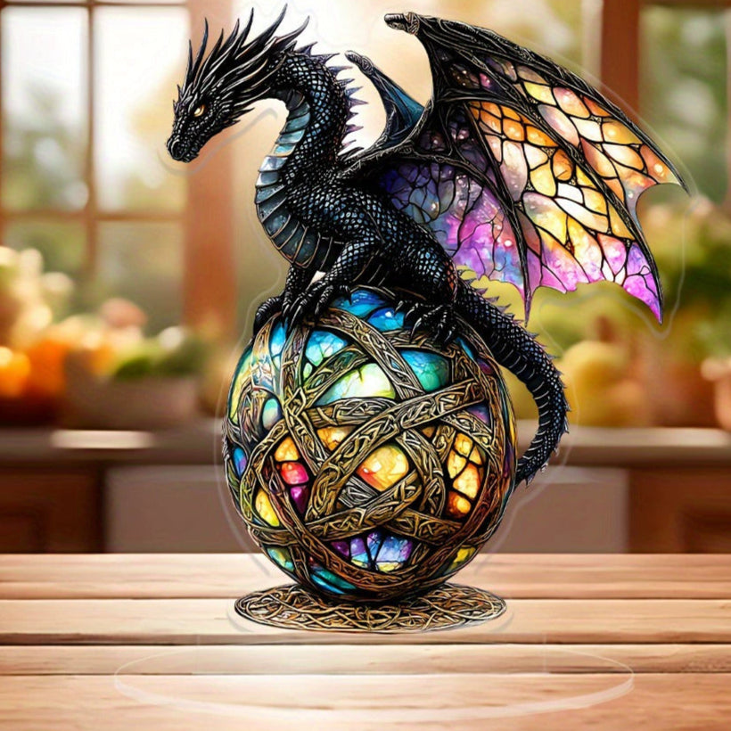 Ebon black dragon acrylic tabletop ornament on a wooden surface