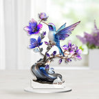 Humi and Bloom acrylic bird ornament near a window