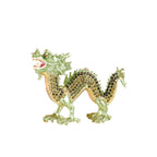 Green dragon figurine against a white background