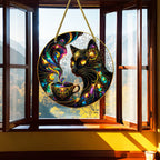 MoonCat cat and coffee ornament hanging in an open window