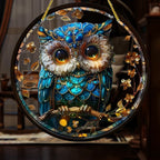 Blue and gold owl hanging ornament with branch details