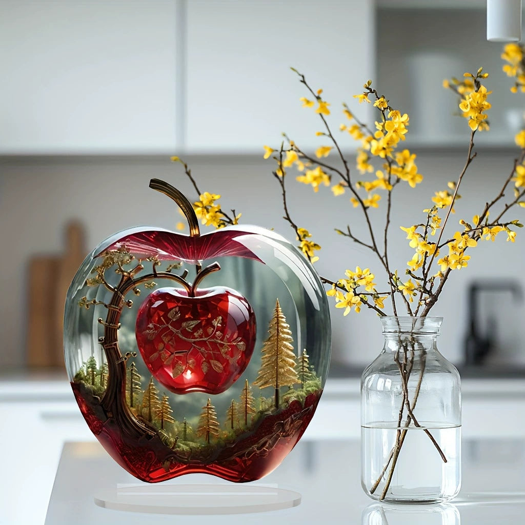 Apple-shaped forest artwork on a flat acrylic tabletop ornament