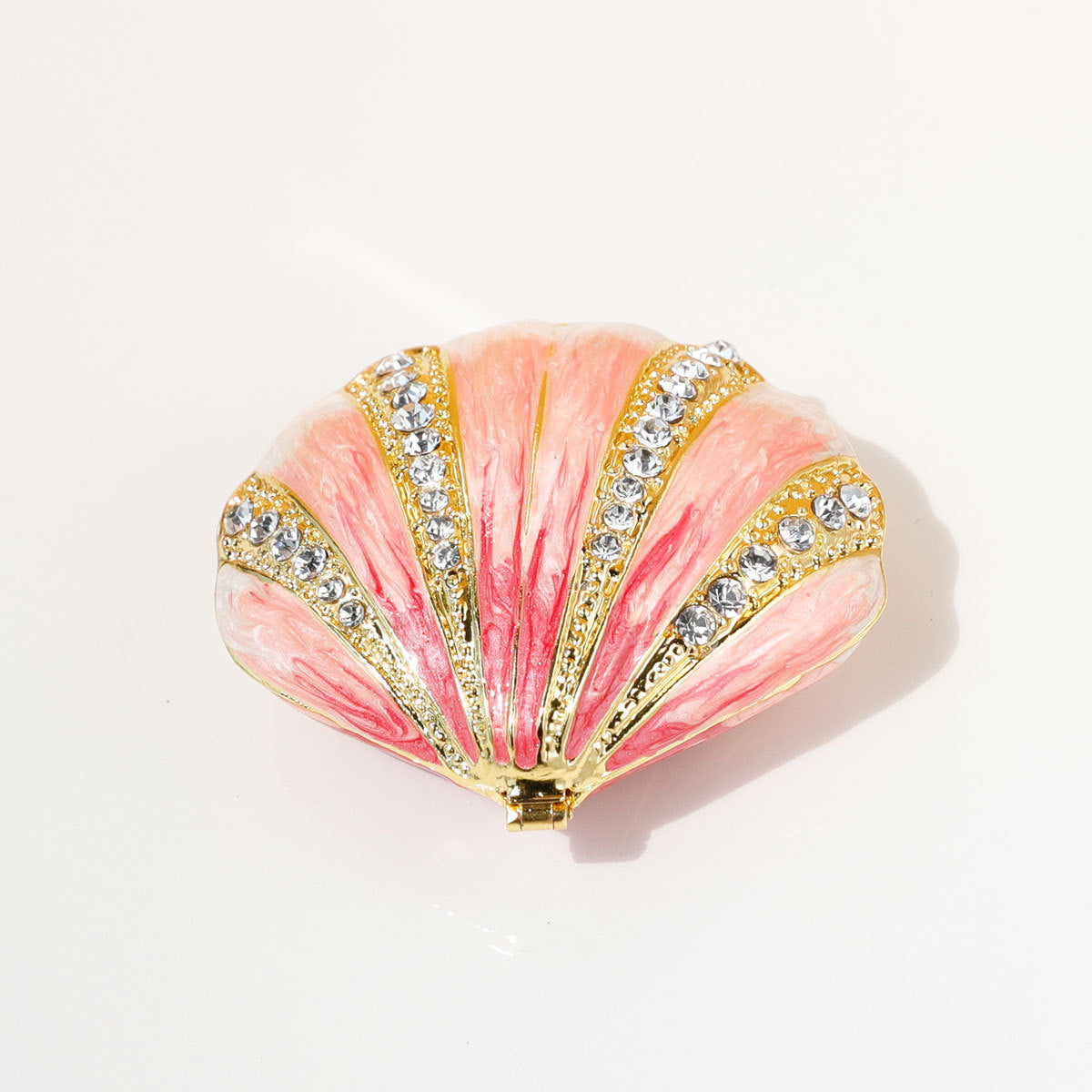 Top view of pink shell-shaped jewelry box