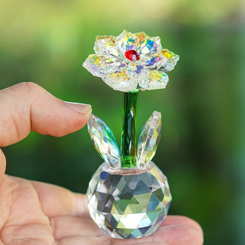 Sunflower glass ornament held in a hand