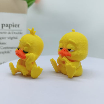 A cute playful and fun little heart-shaped duck figurine perfect for home decor
