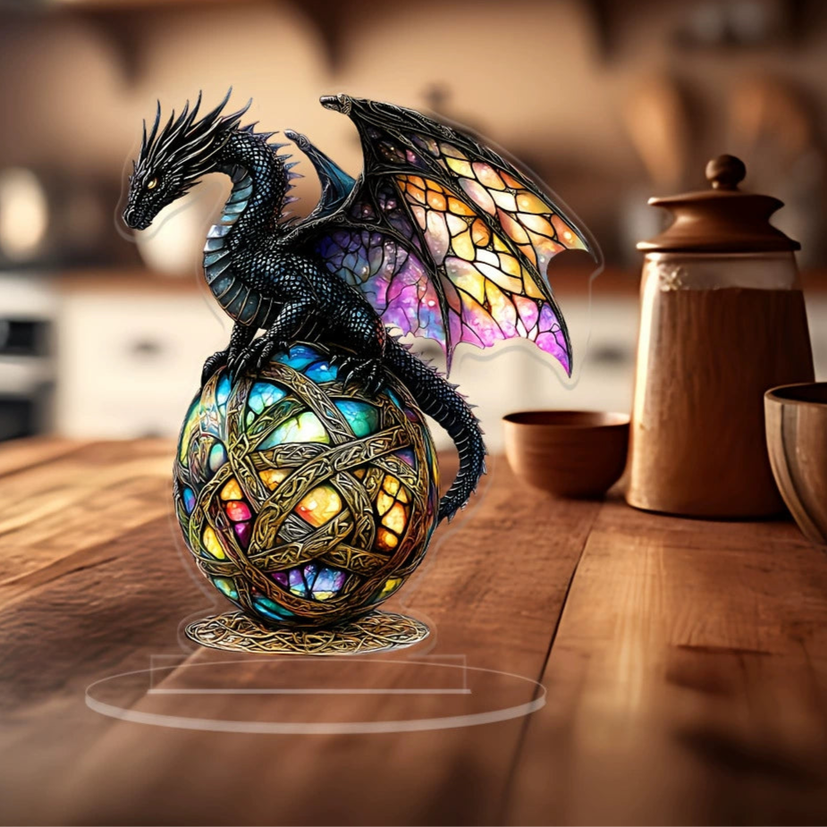 Ebon dragon acrylic tabletop ornament shown at an angle on its clear base