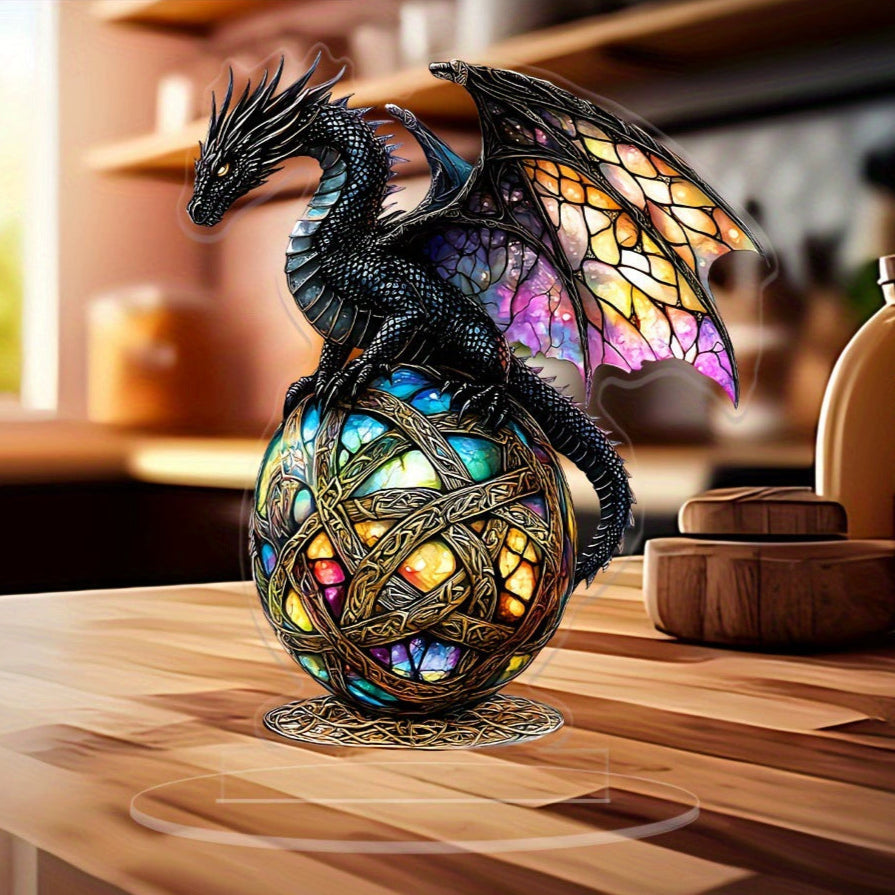 Black dragon 2D acrylic ornament displayed on a table near shelving