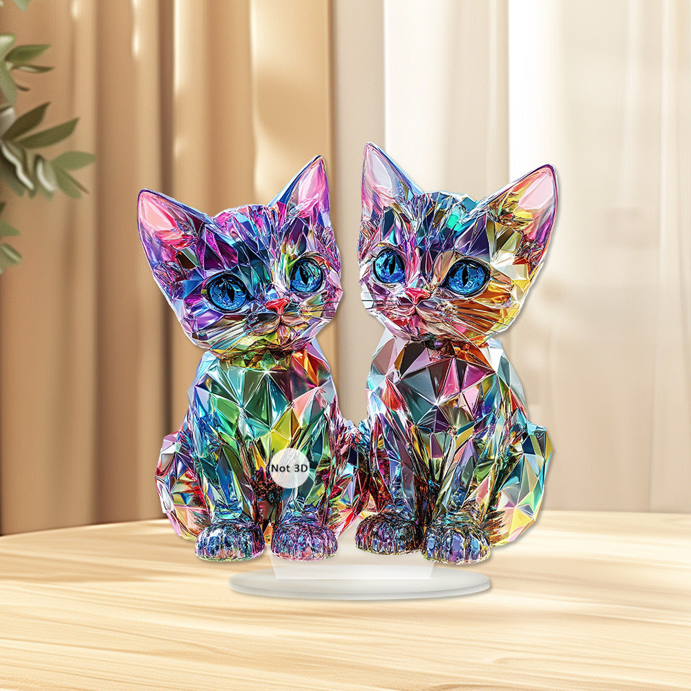Lumi two colorful cats acrylic ornament beside a window