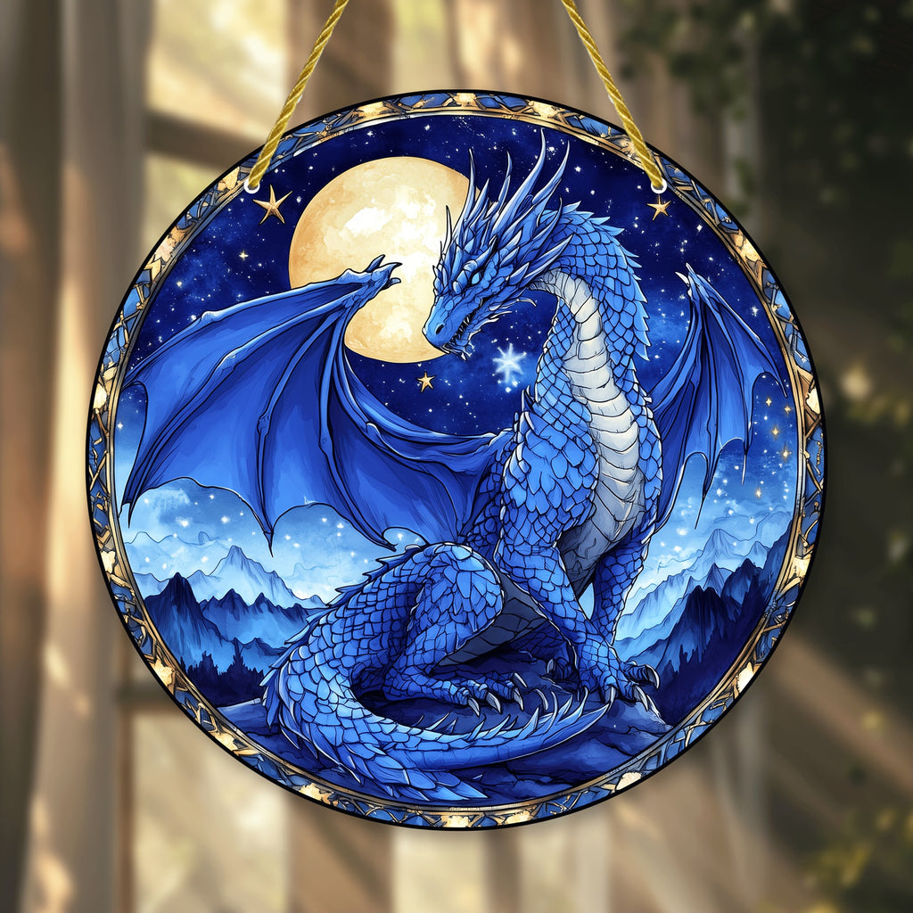 Close view of blue dragon and moon artwork on a round hanging ornament