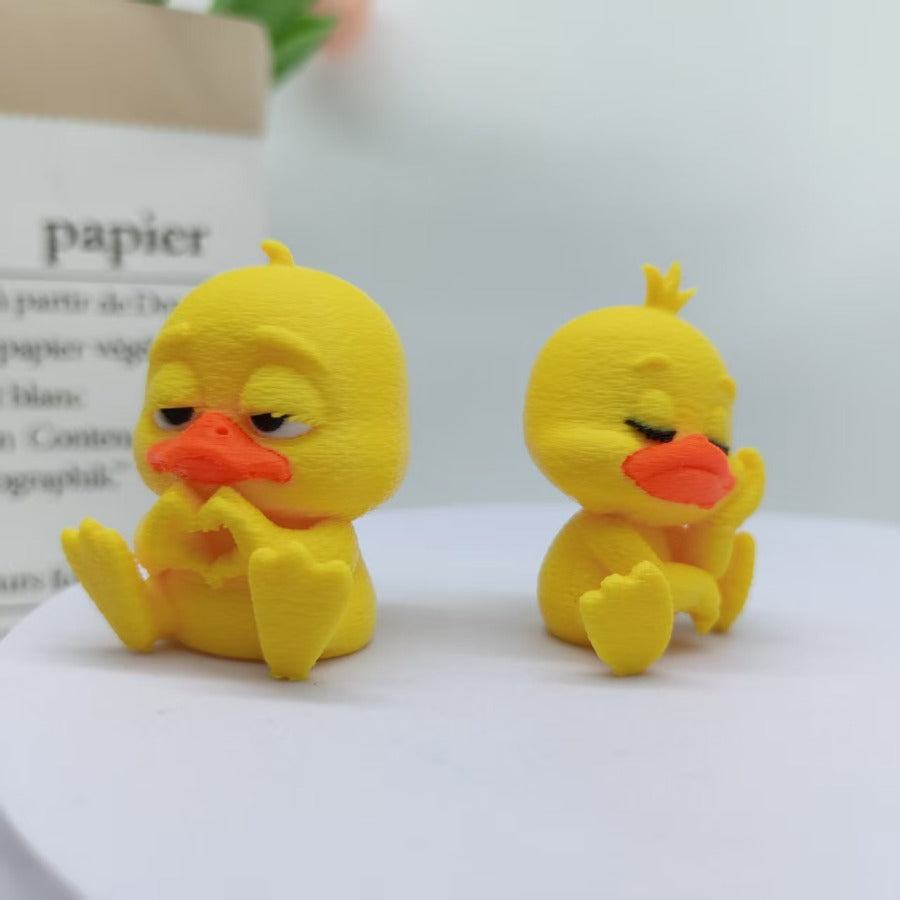 A cute playful and fun little heart-shaped duck figurine perfect for home decor