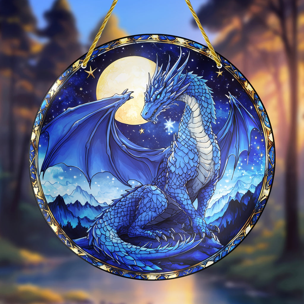 Round blue dragon hanging ornament against a fantasy landscape background