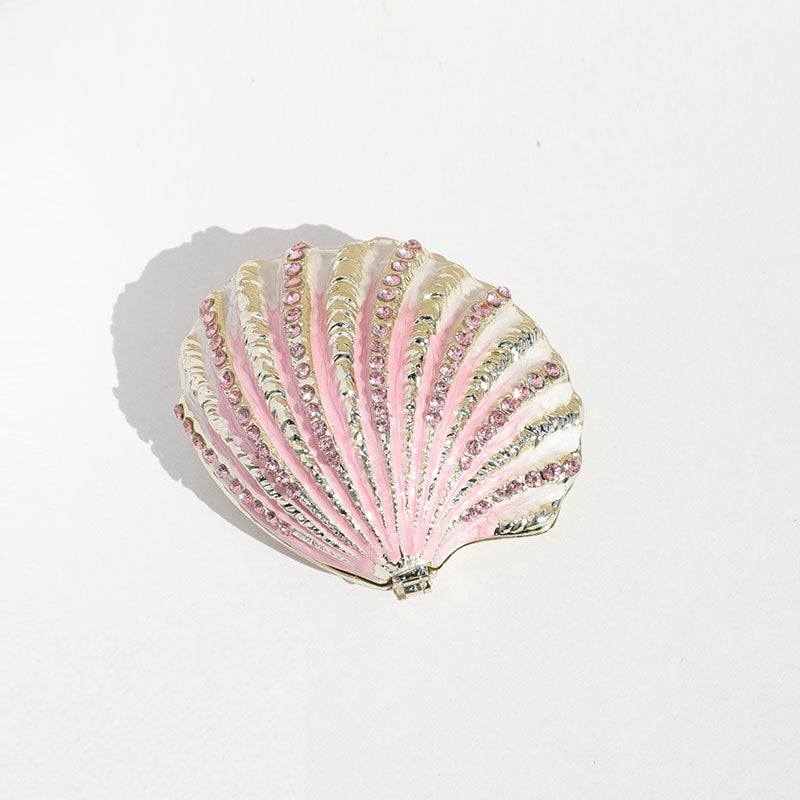 Pink shell-shaped enamel jewelry box with ridged lid